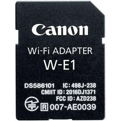 Цифровой фотоаппарат Canon EOS 7D Mark II + объектив 18-135 IS USM + WiFi адаптер W-E1 (9128B163)